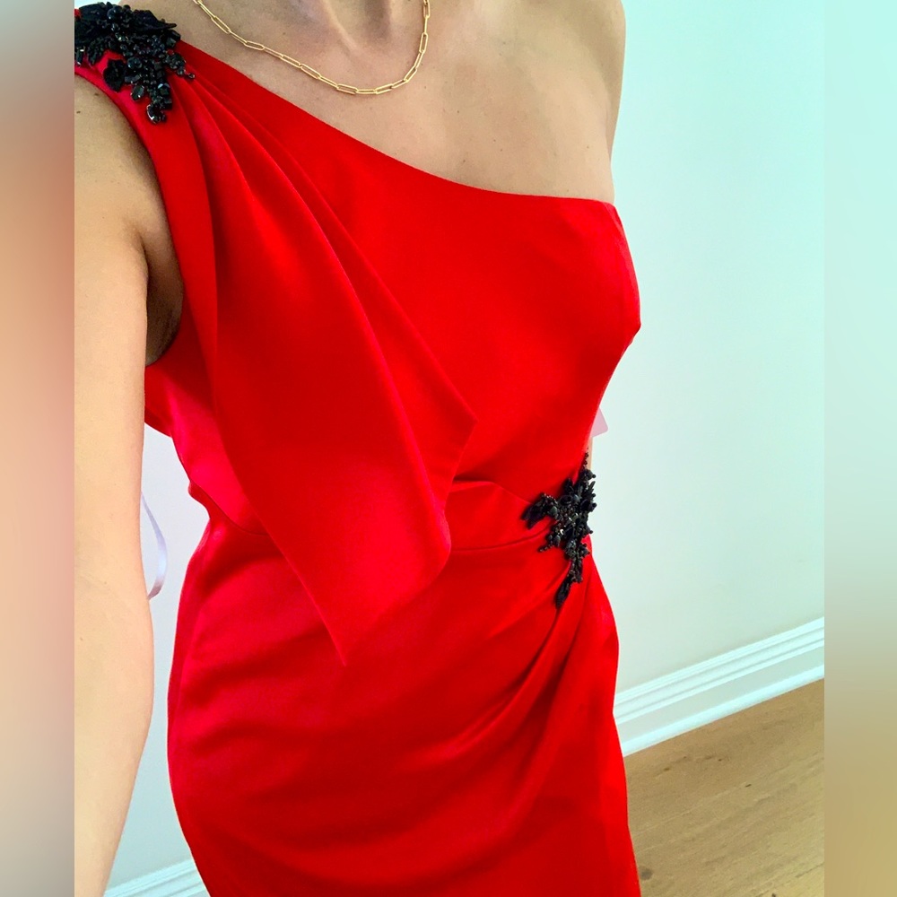 Marchesa red asymmetric dress.